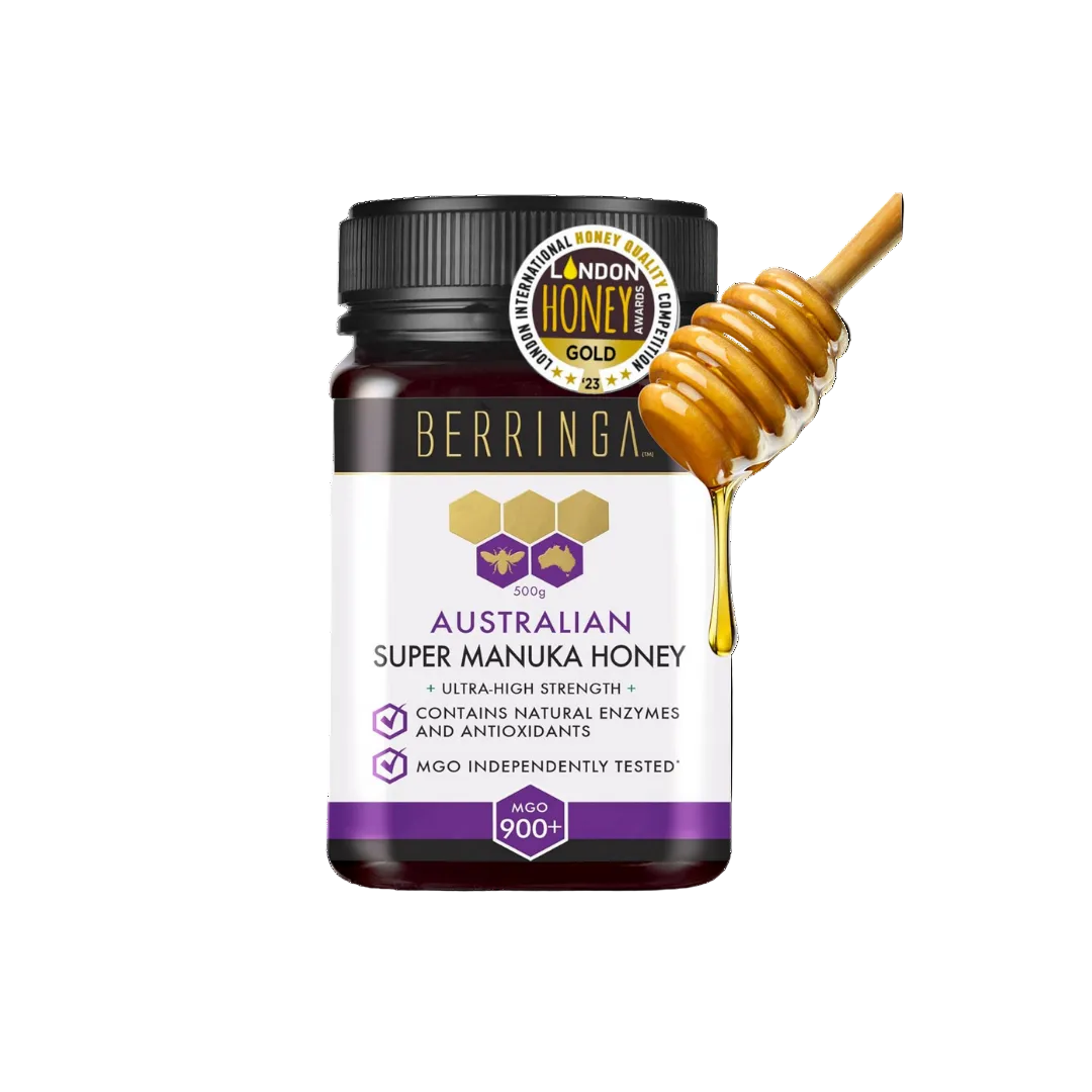 Berringa Australian Super Manuka Honey jar with a honey dipper on a white background