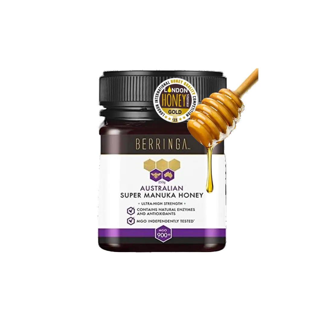Berringa Australian Super Manuka Honey jar with honey dipper on a white background