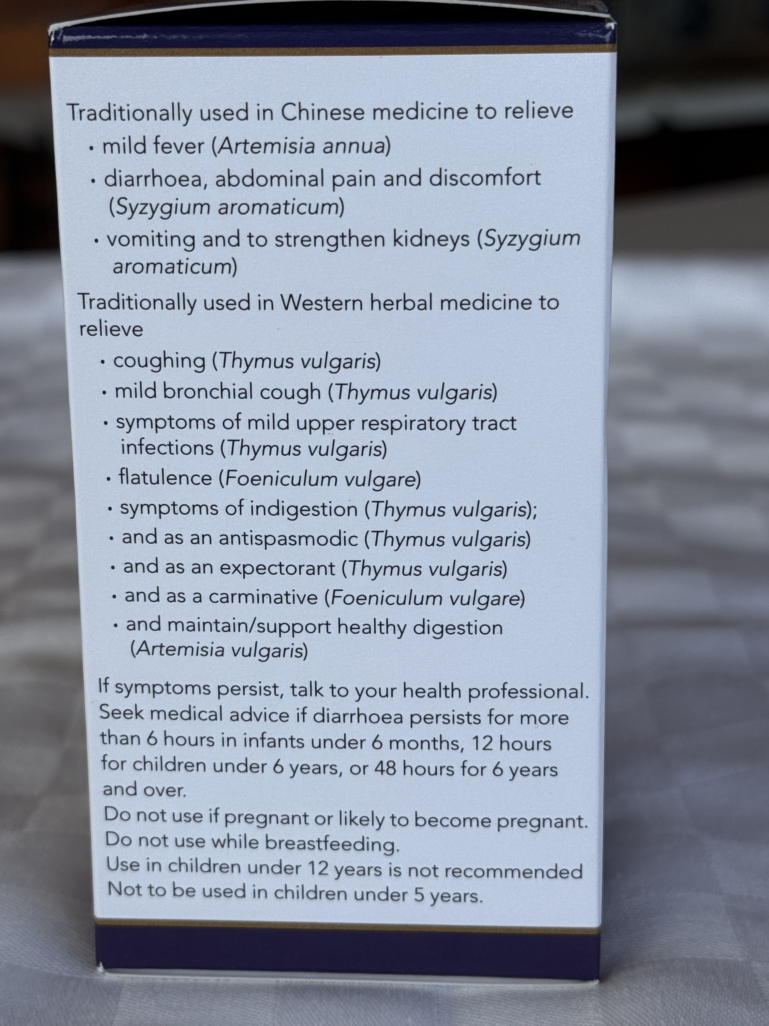 Box with herbal medicine information on a blurred background