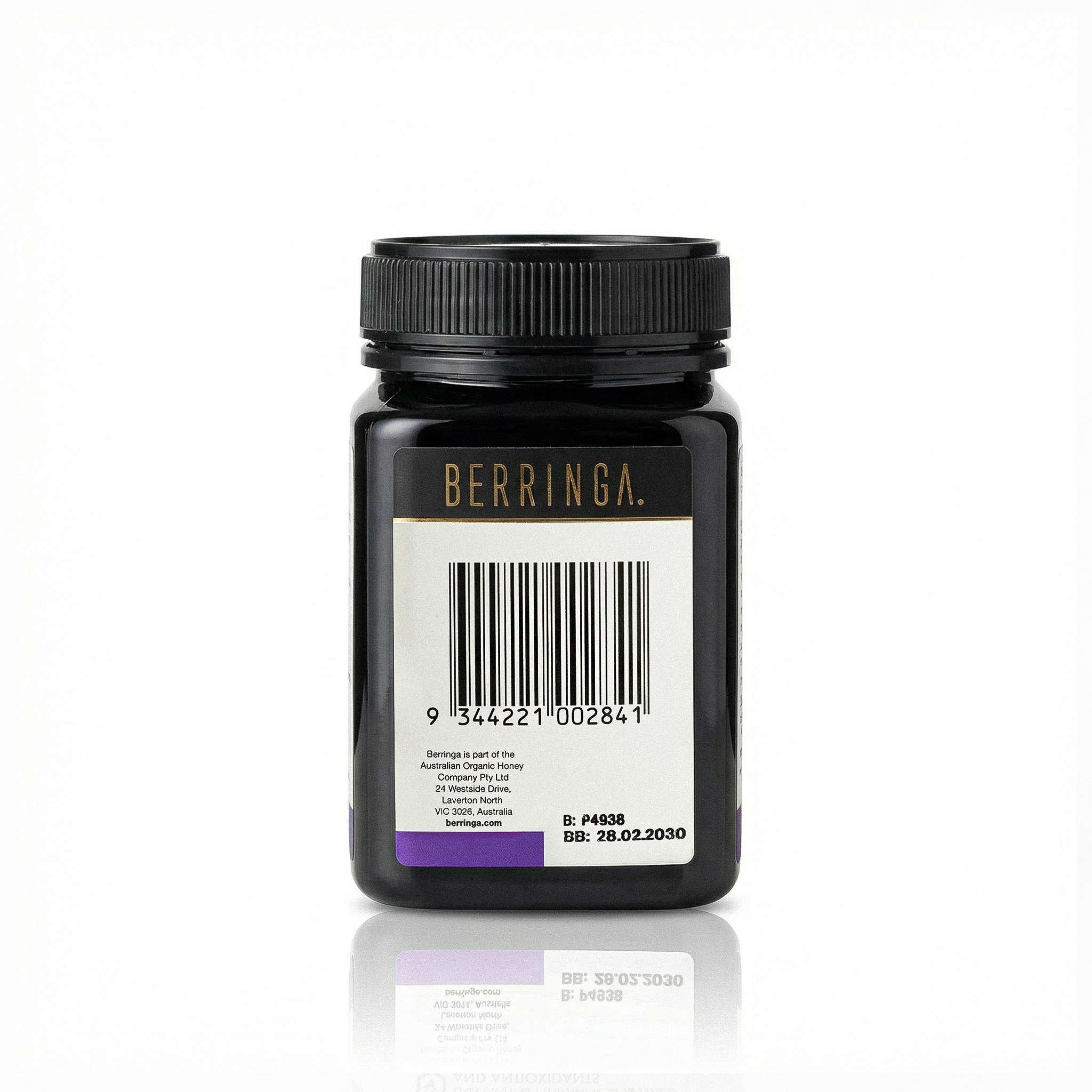 Black jar with a label on a white background