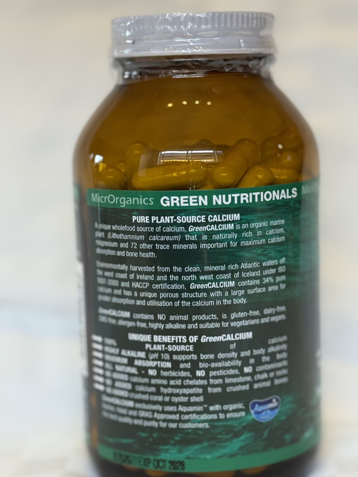 Bottle of Green Nutritionals Pure Plant-Source Calcium with visible label on a white background